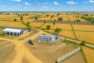 Aerial view of Orion City Kharkhoda Sector 4 plotted township in bright daylight near Maruti Plant and IMT